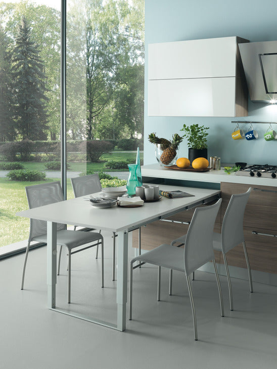 Pull-out table and folding fitting, with folding table leg